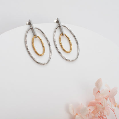 Silver Oval Hoop Earrings with Inner Golden Oval Accent