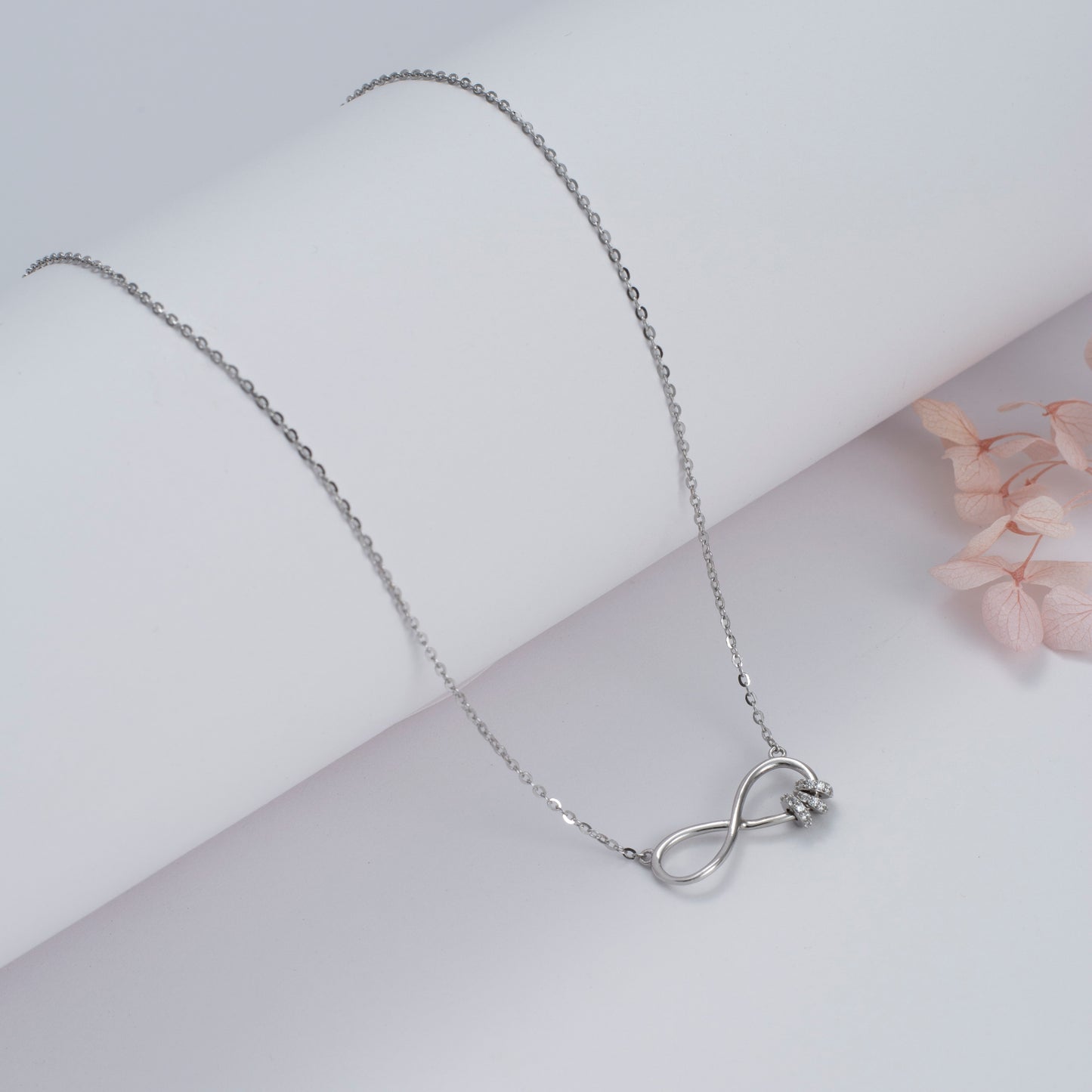 Silver Infinity Chain Pendant with Diamond Accents